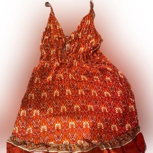 Red casual spring dress. XL-fits more like a L but enough give for an XL to wear